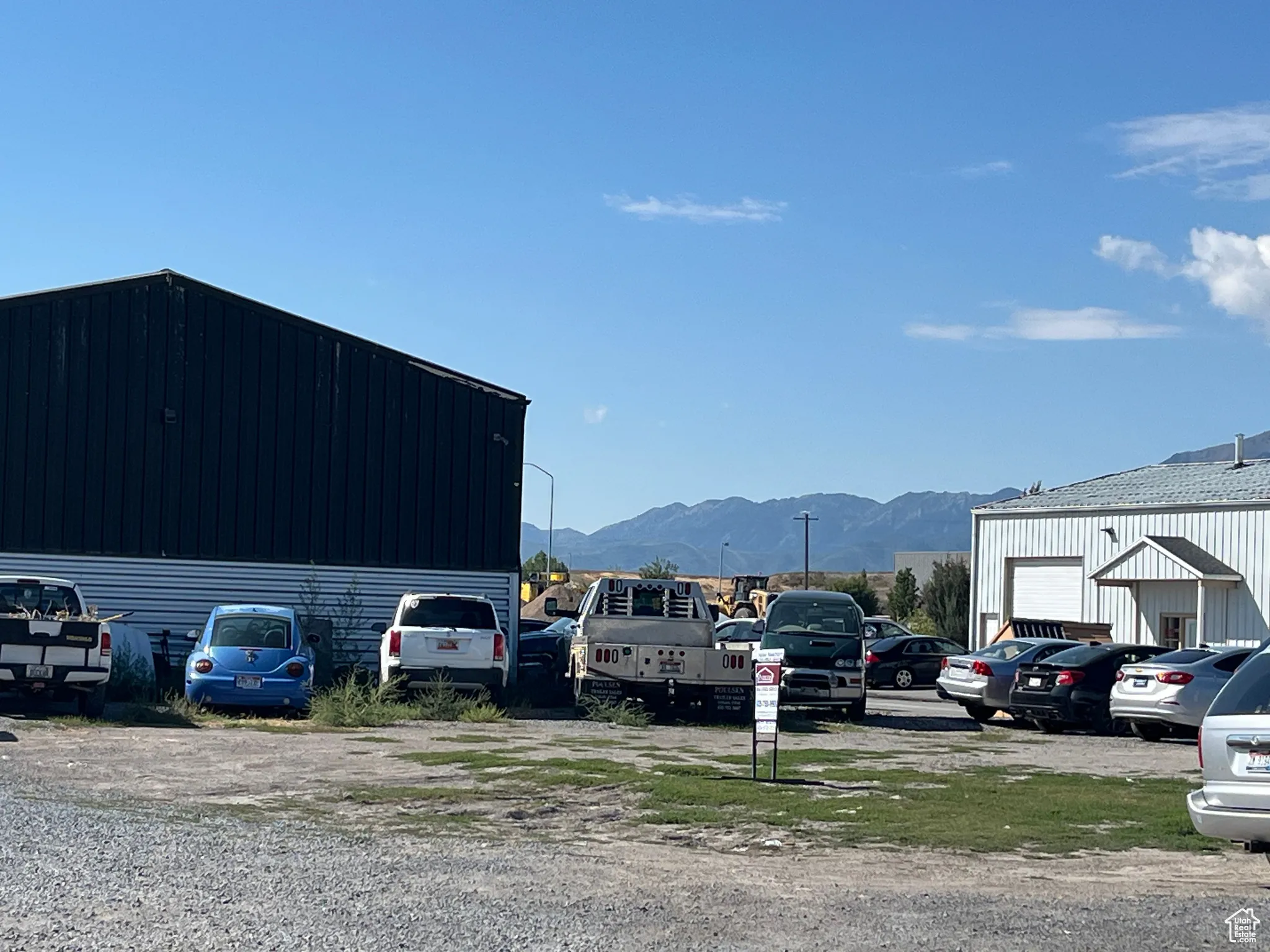Uncovered parking lot with a mountain view