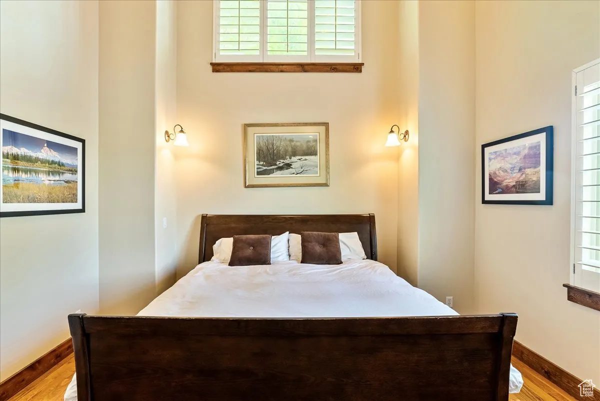 Bedroom with wood finished floors