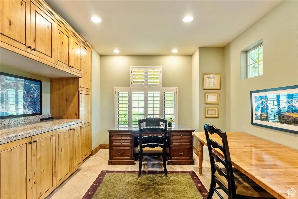 Office featuring recessed lighting and light tile patterned flooring