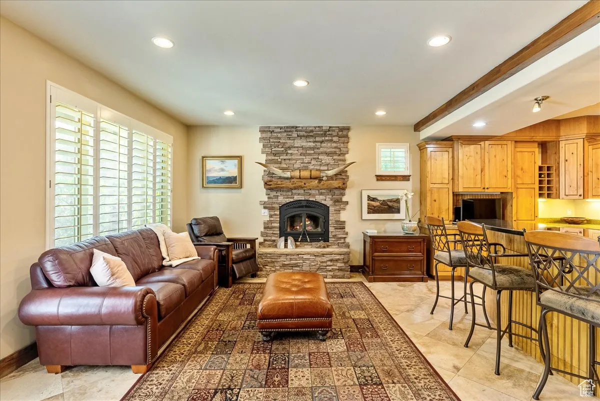 Living area featuring a fireplace and recessed lighting