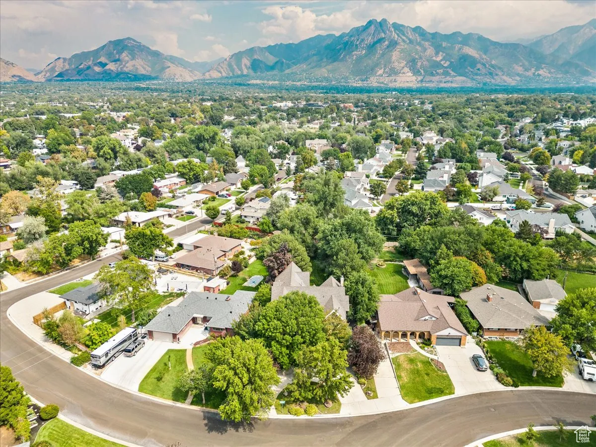 Aerial view of residential area with mountains