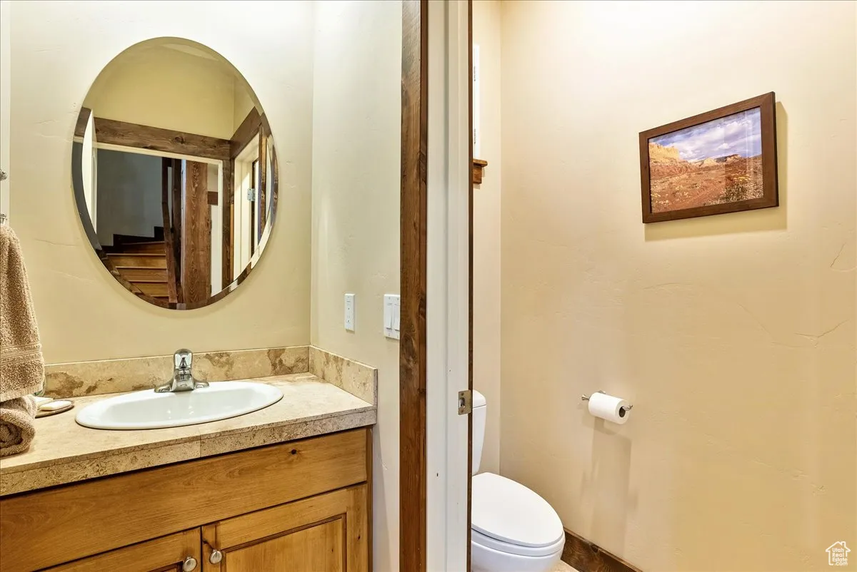Bathroom with vanity and toilet