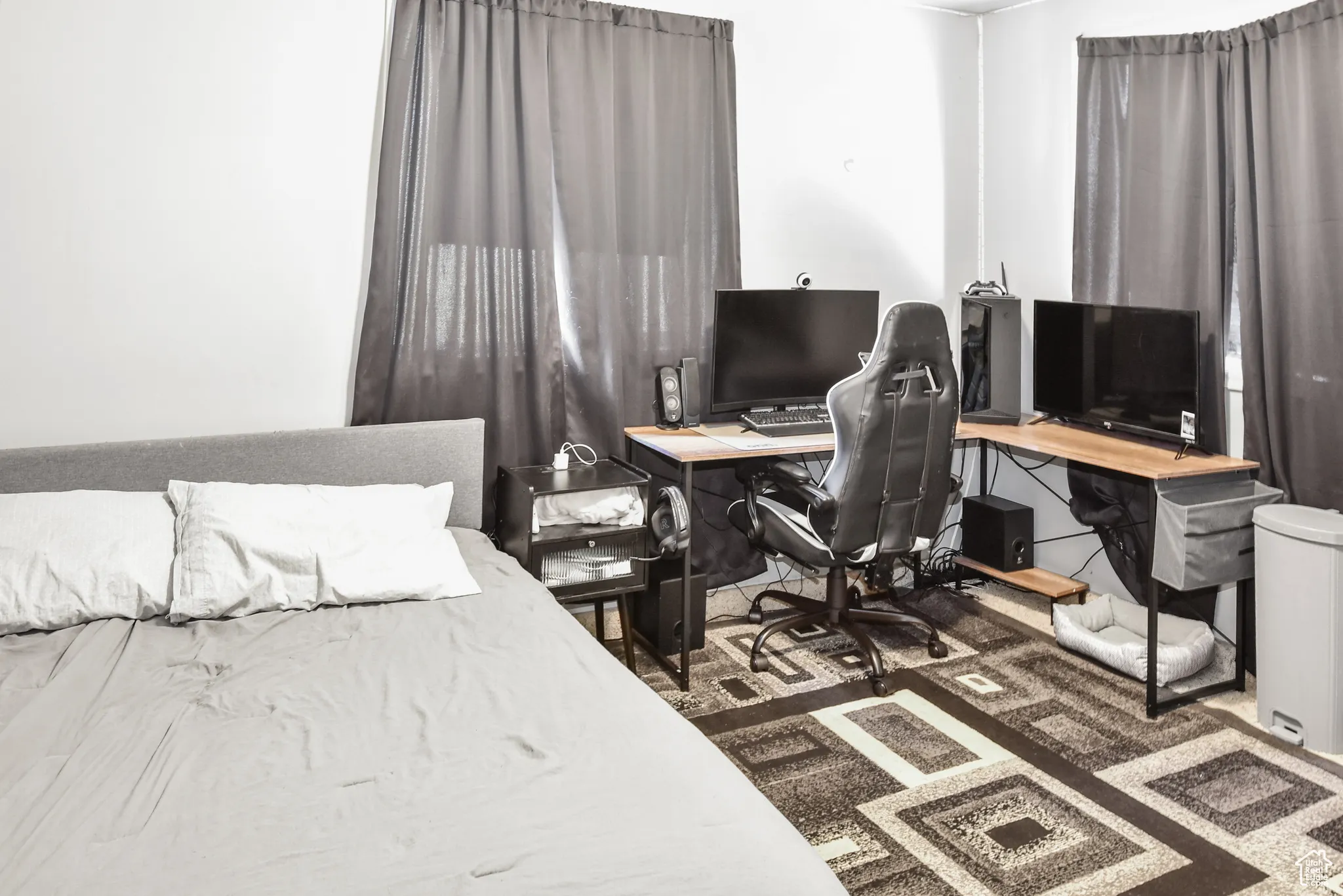 Bedroom featuring an office area