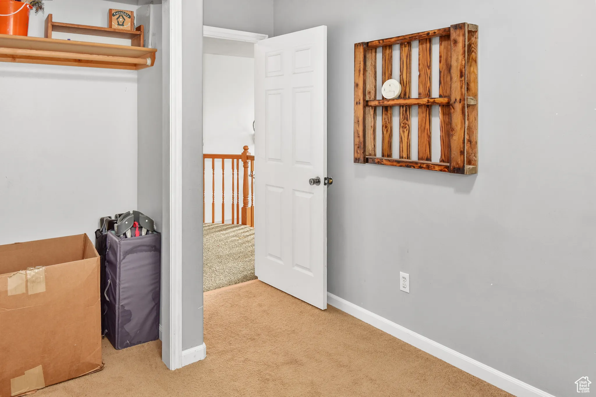 Unfurnished bedroom featuring carpet flooring and baseboards