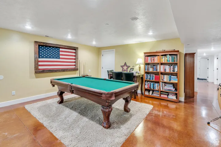 Playroom with pool table, recessed lighting, and finished concrete floors