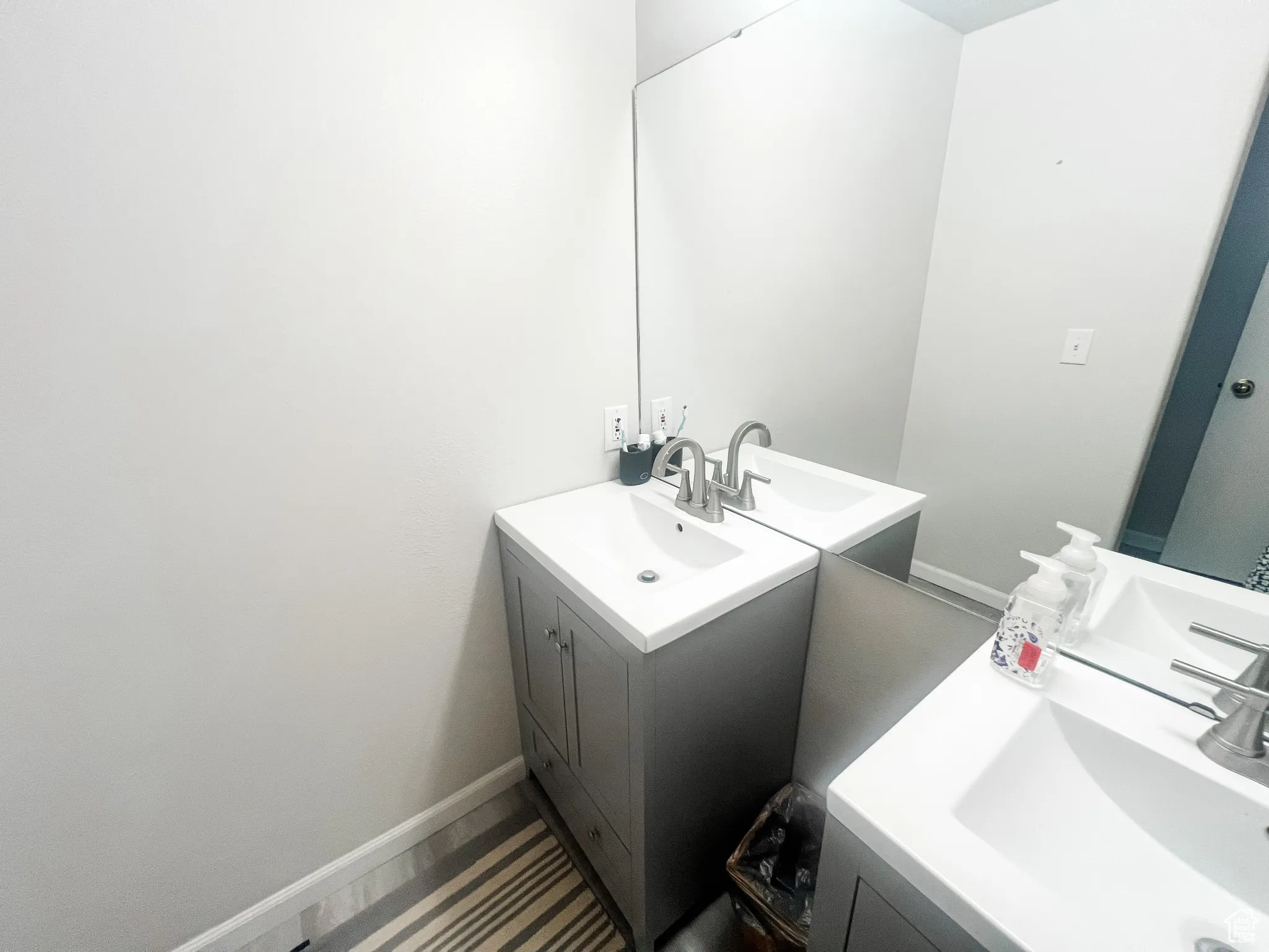 Basement Bathroom with Double Vanities