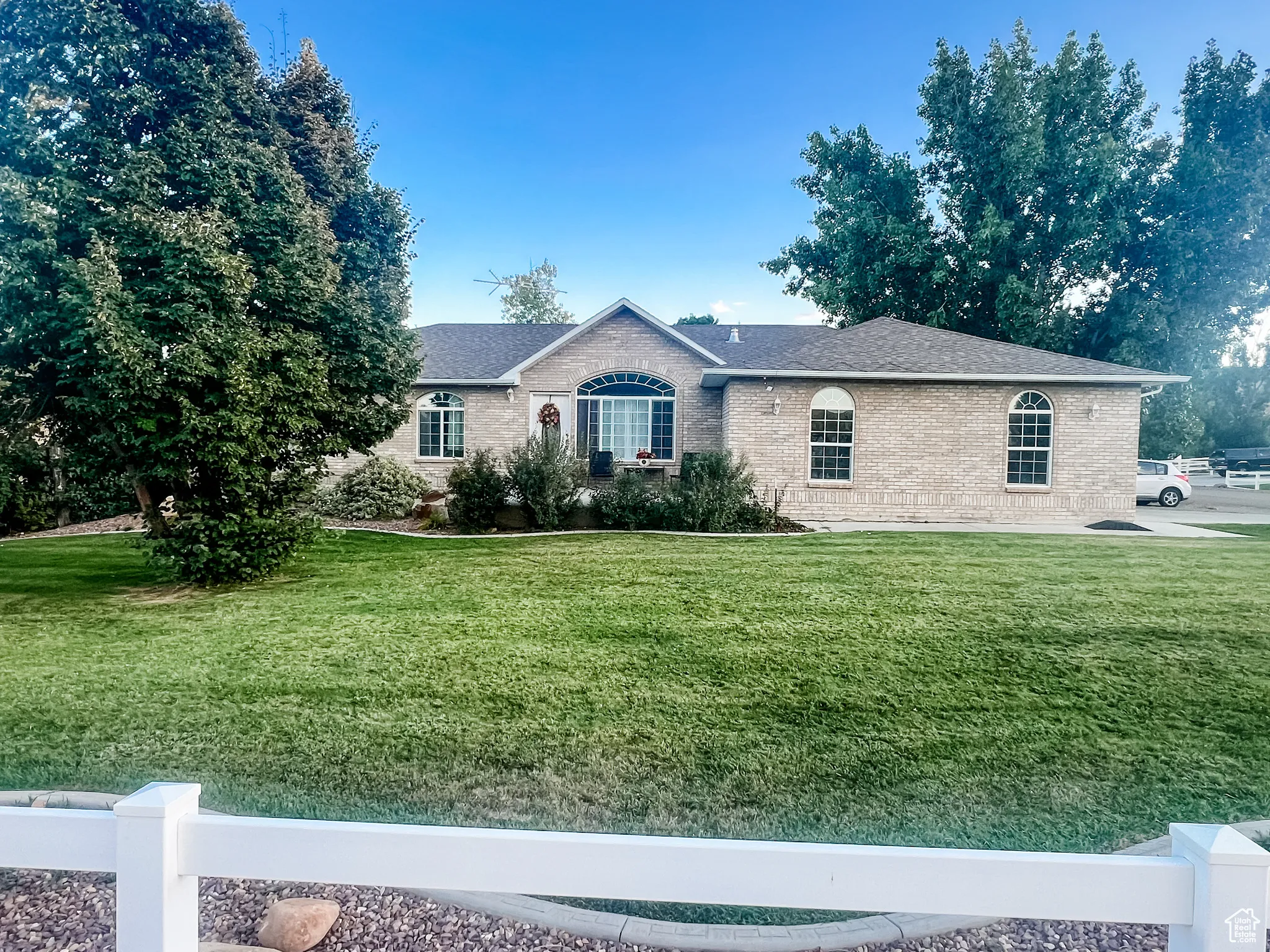 Ranch-style home with brick siding