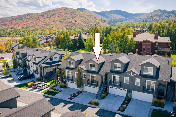 Aerial perspective of suburban area with mountains