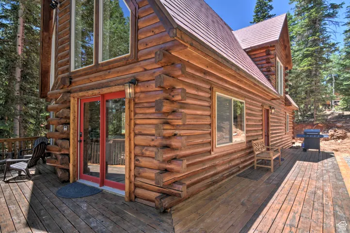 Wooden deck featuring grilling area