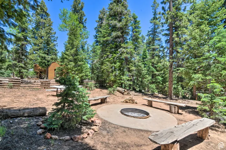 View of yard with a fire pit