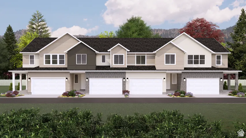 Traditional-style house featuring a garage