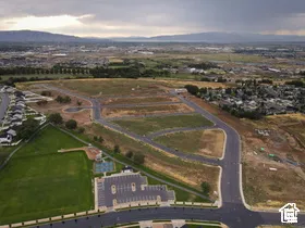 Aerial view of property's location with a mountain backdrop