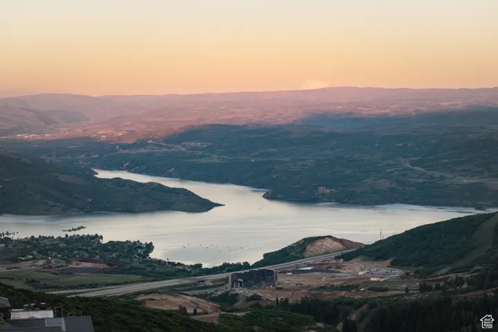 Aerial view at dusk of a water and mountain view
