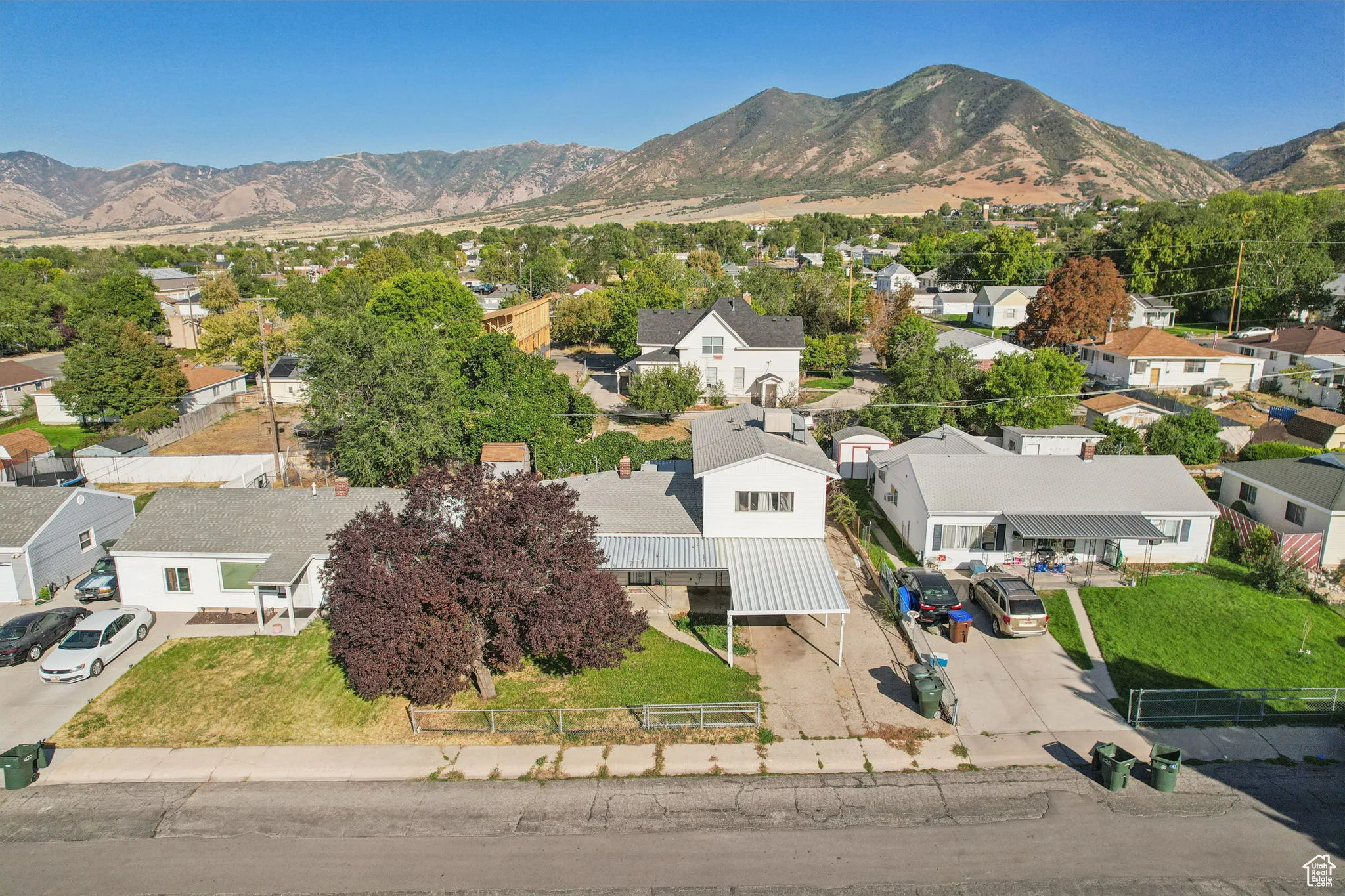 Aerial view of residential area with a mountainous background