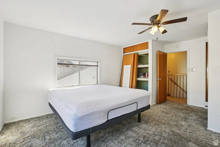 Bedroom with carpet floors and ceiling fan