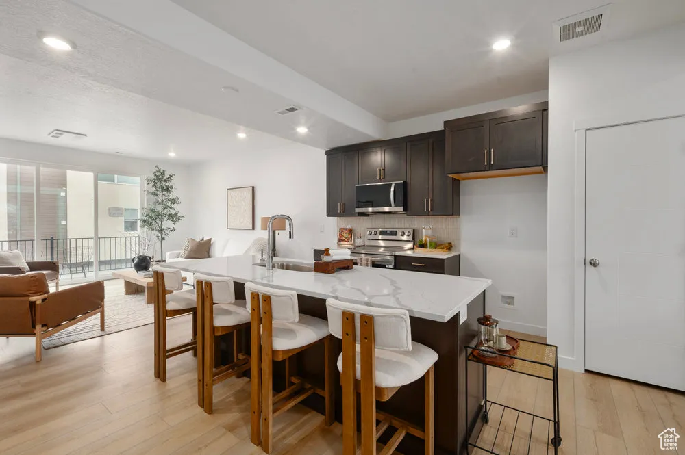 Prep, host, or hang out-this kitchen was built to handle it all in style. *model home