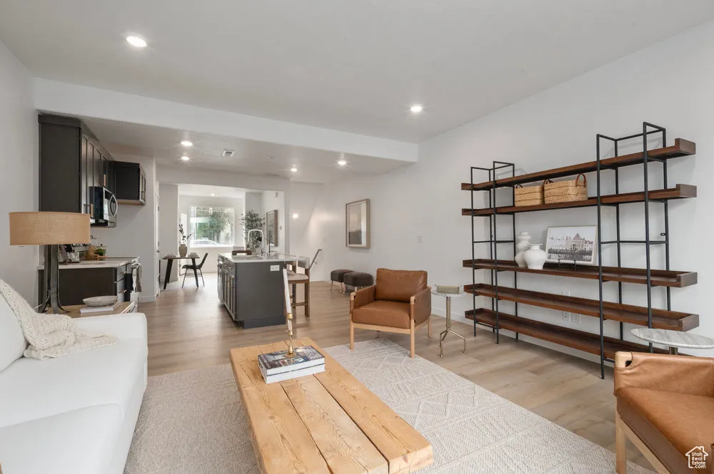 Where style meets comfort: a living room designed for relaxing, entertaining, and everyday living. *model
