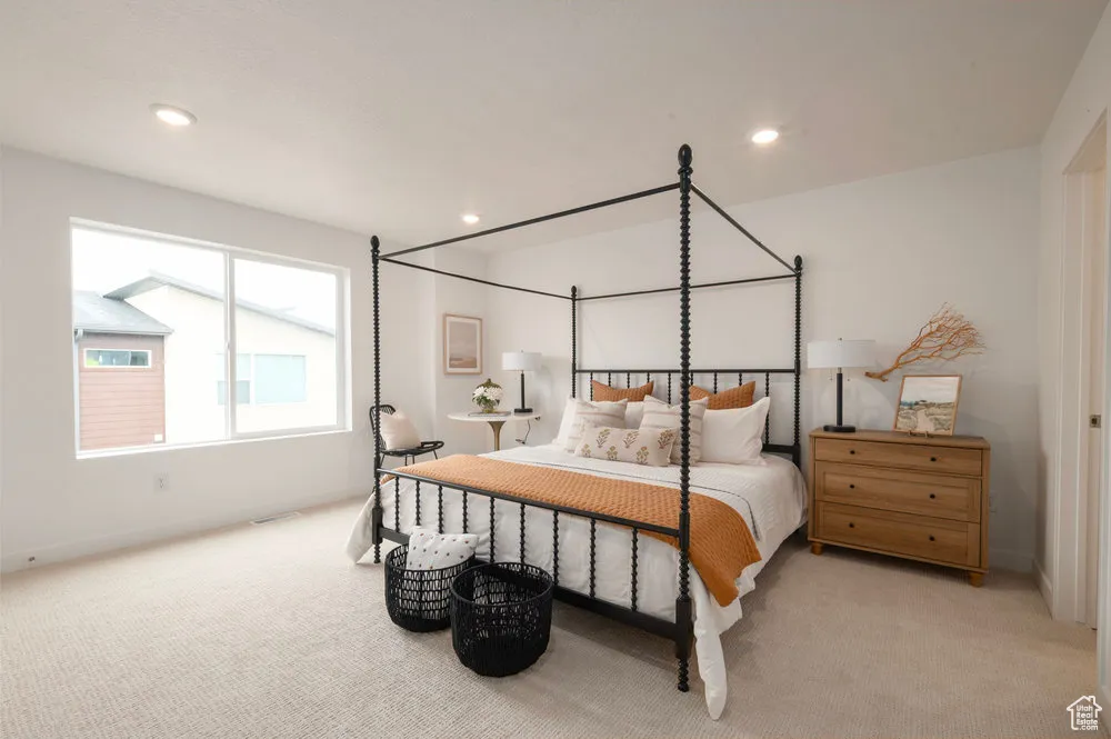 Spacious and serene with dreamy light and that just-right wall for your statement headboard.