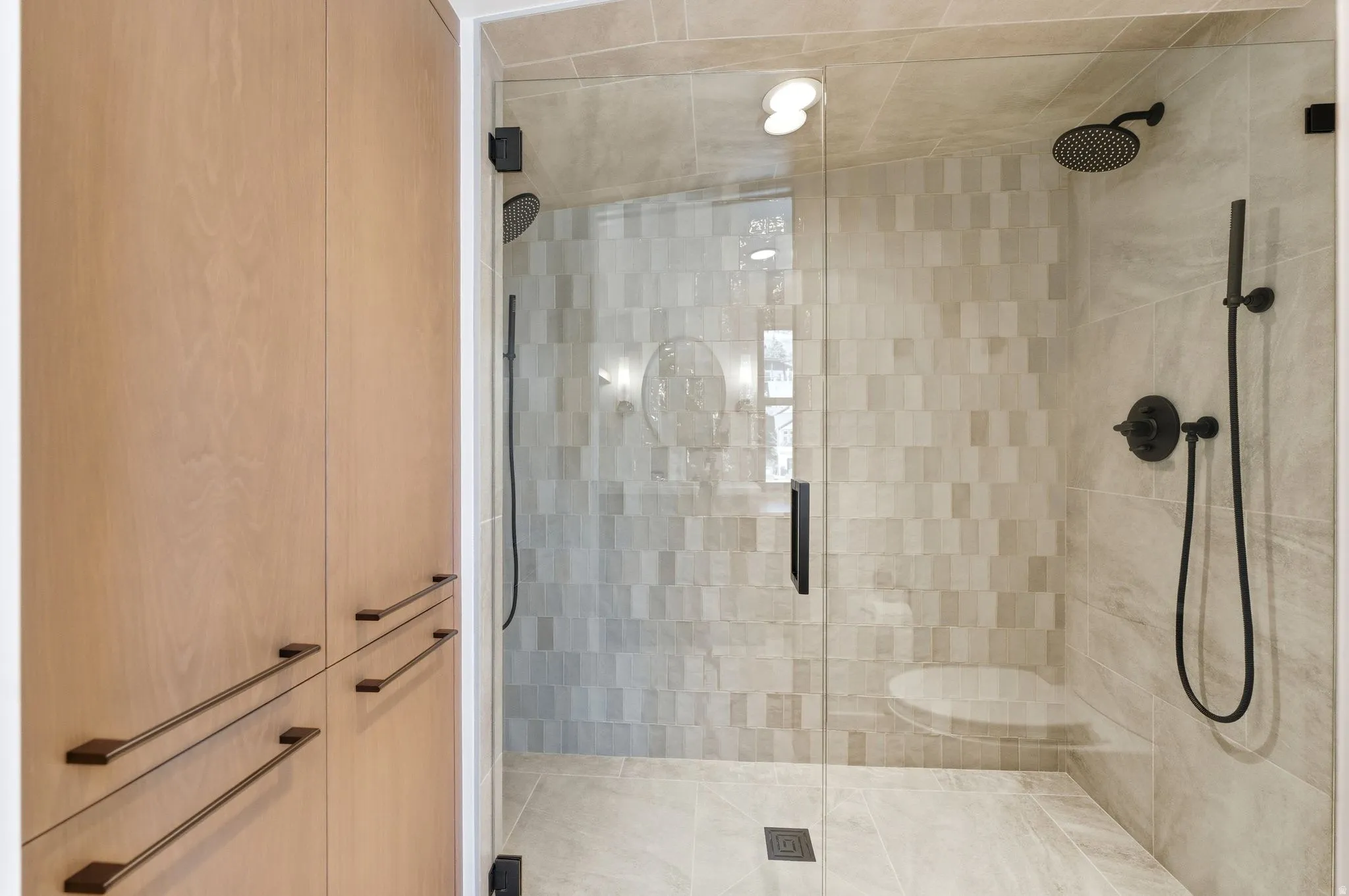 Full bathroom featuring a stall shower