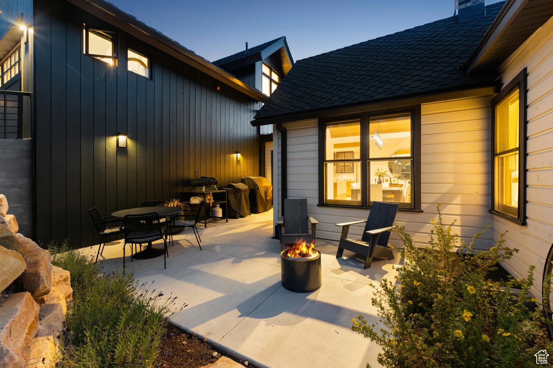 View of patio / terrace with an outdoor fire pit and outdoor dining area