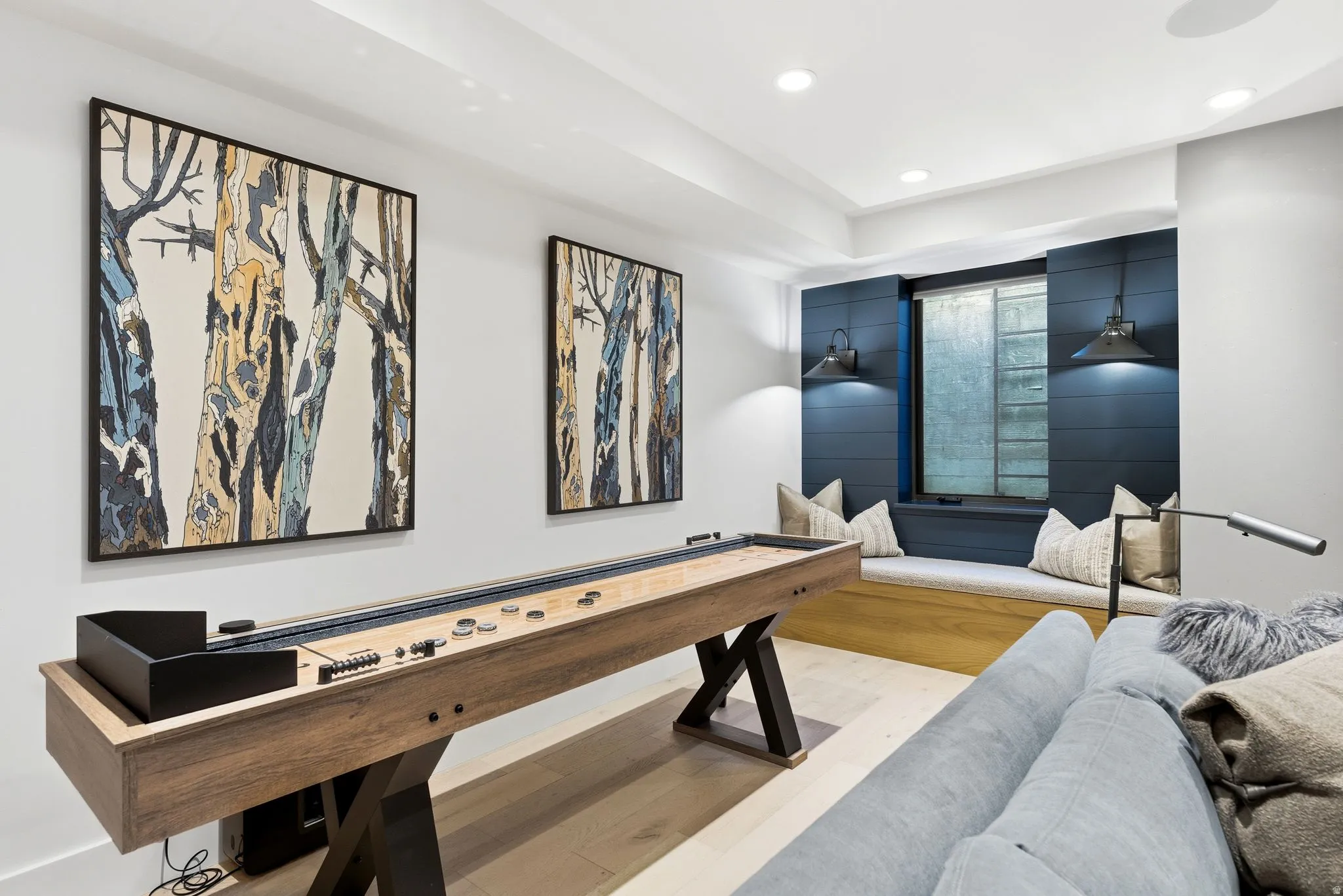 Recreation room with recessed lighting and wood finished floors