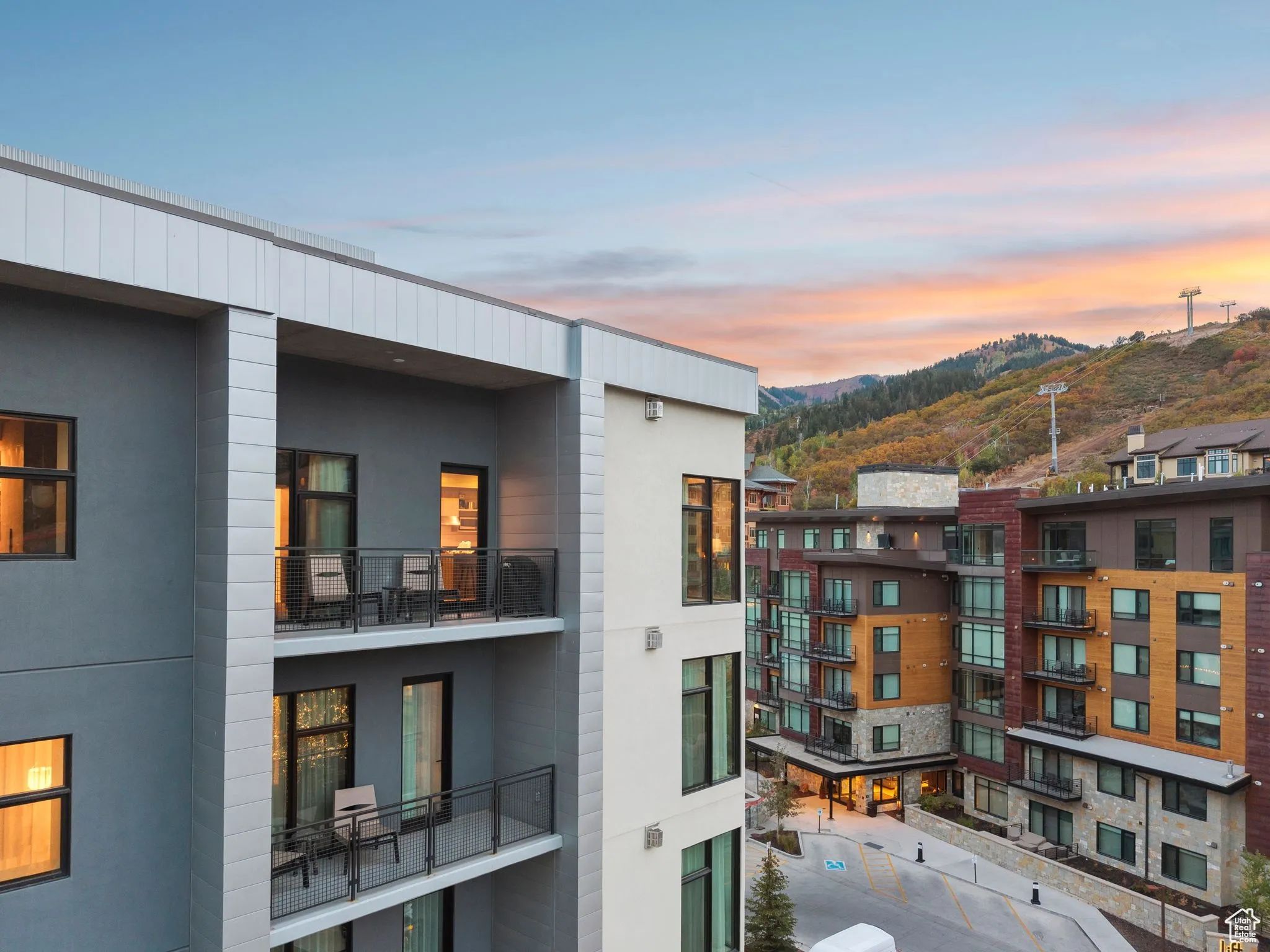 Property at dusk featuring a mountain view