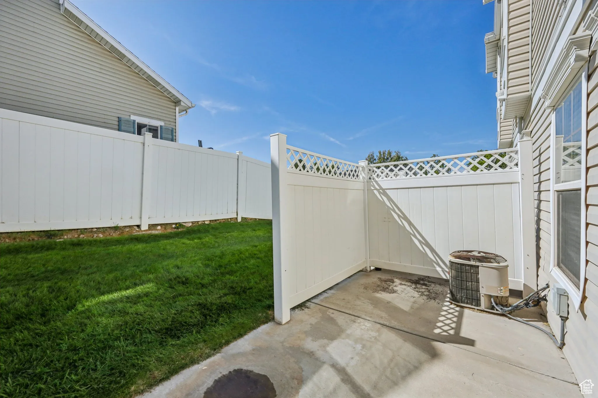 Fenced backyard featuring a patio area
