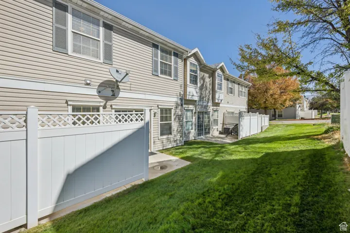 Rear view of house featuring a patio area