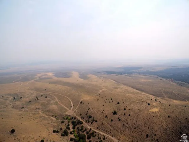 Aerial view of property's location featuring rural landscape