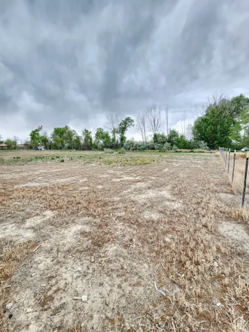 View of yard with a view of countryside