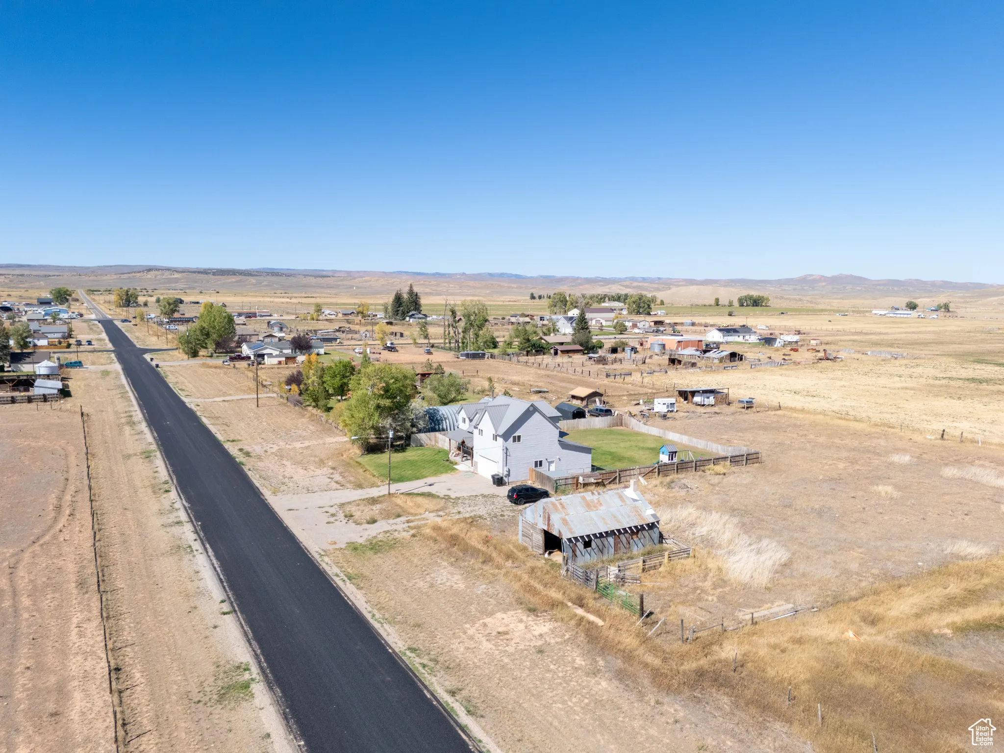 Aerial view of sparsely populated area with mountains