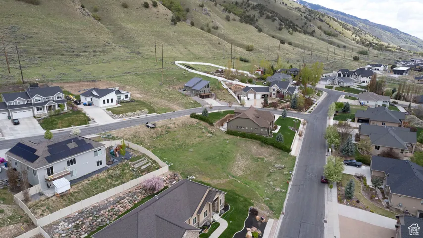 View of property location with nearby suburban area