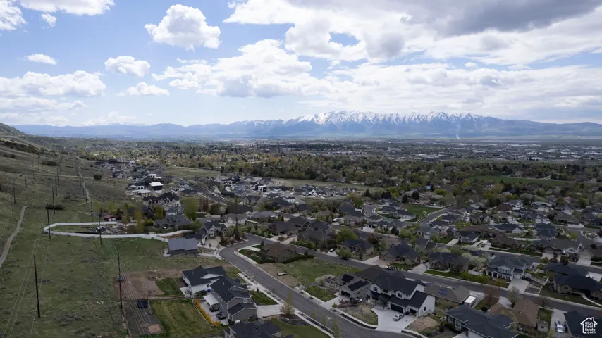 Aerial overview of property's location featuring nearby suburban area and a VIEW of the Wellsville Range.