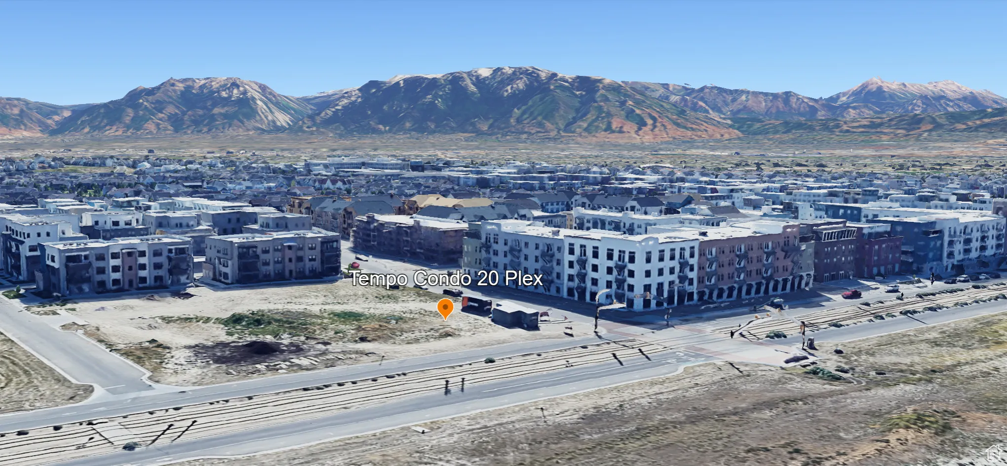 Mountain view featuring nearby urban area