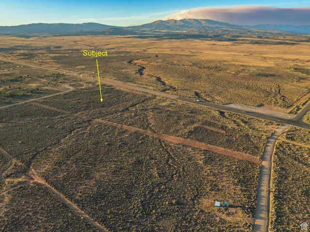 Lot 8A Elk Flat Ranches! Aerial view of property's location with a mountainous background and rural landscape