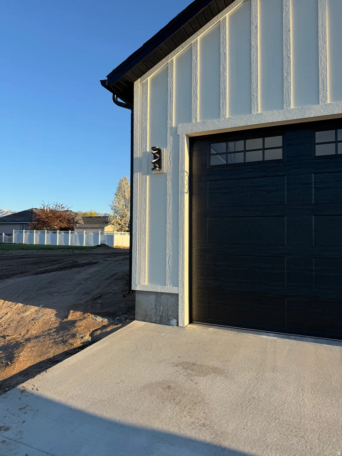 Garage featuring driveway
