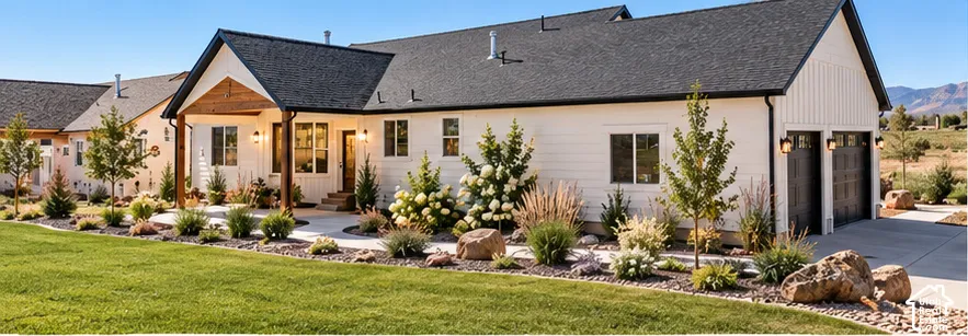 White horizontal siding with dark architectural shingle roofing