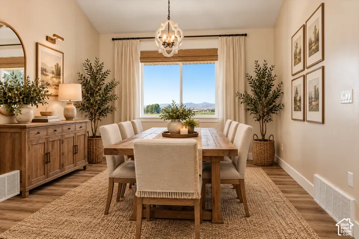 LVP with Wood-finish looking flooring with light-toned walls and window with white trim