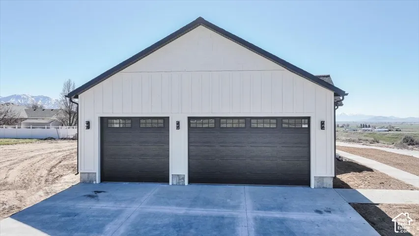Detached garage with a mountain view