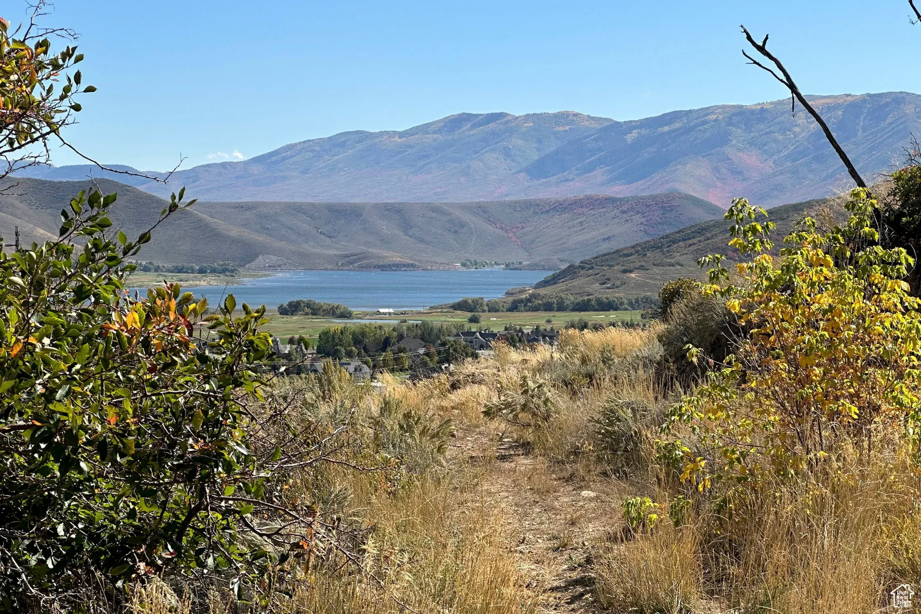 Mountain view featuring a nearby body of water