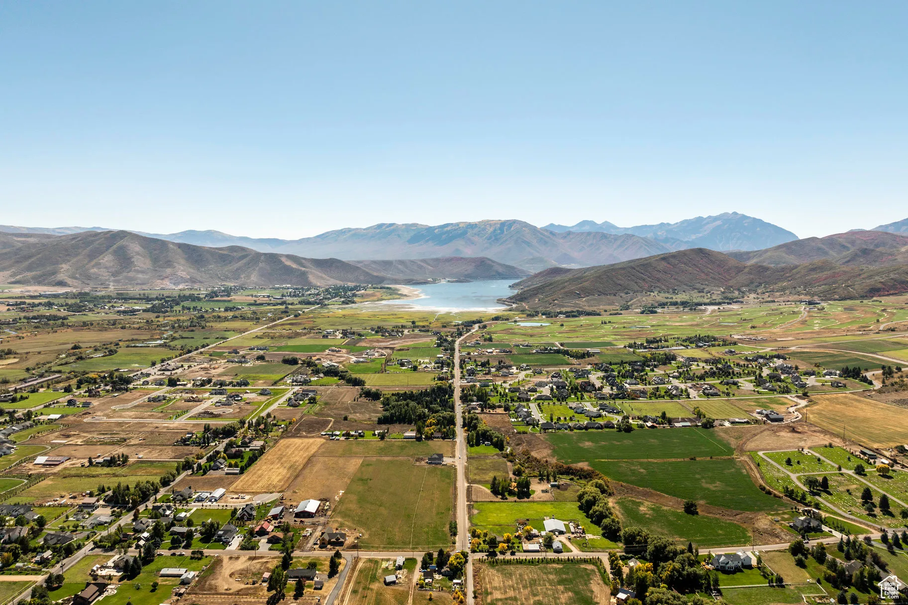 Overview of rural landscape with a water and mountain view