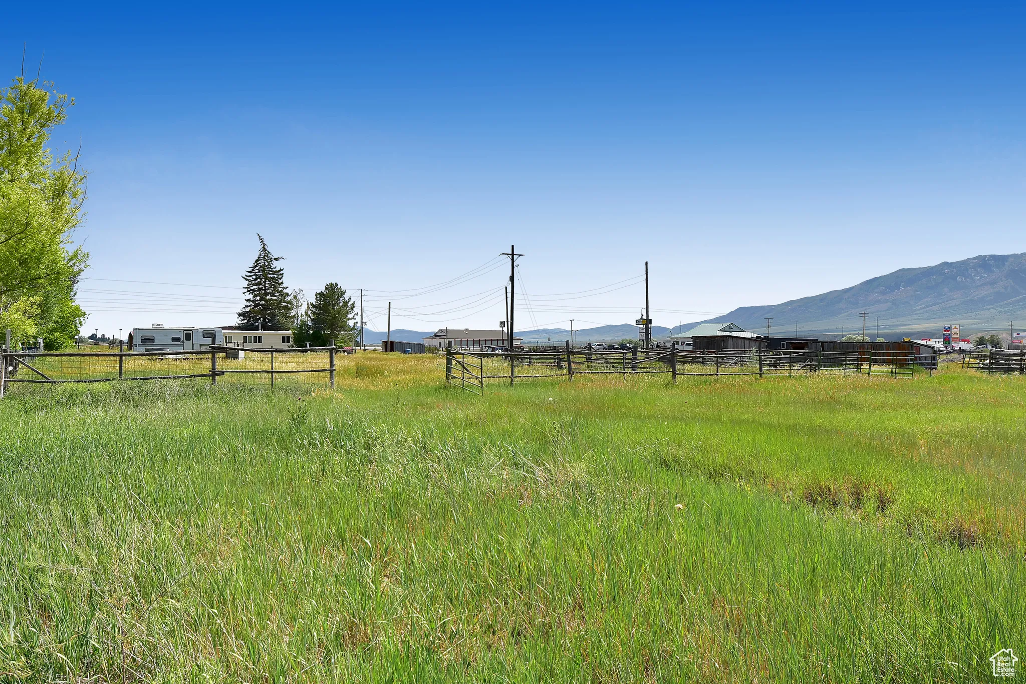 View of yard with a view of countryside and a mountain view