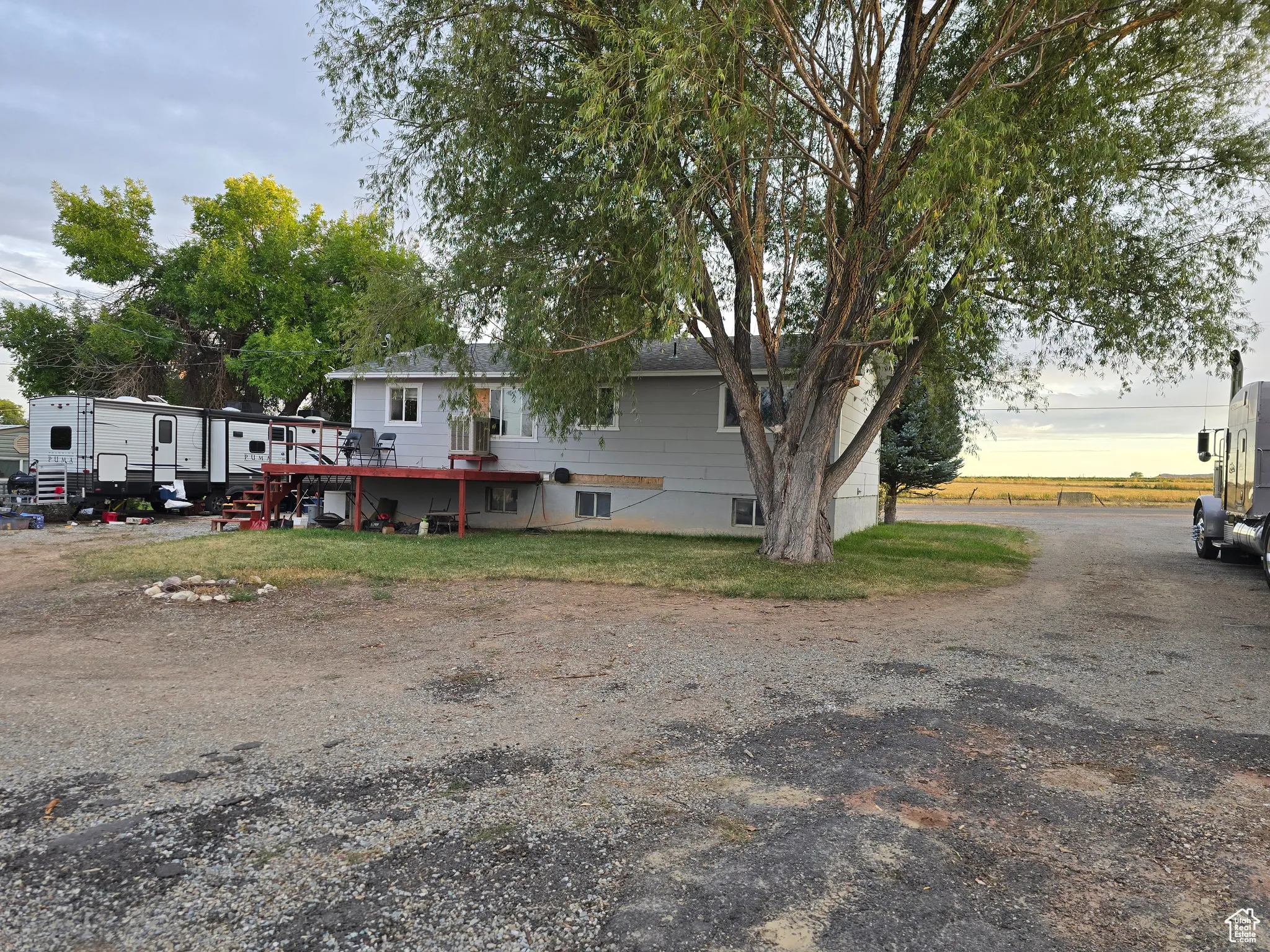 View of front of house with a deck