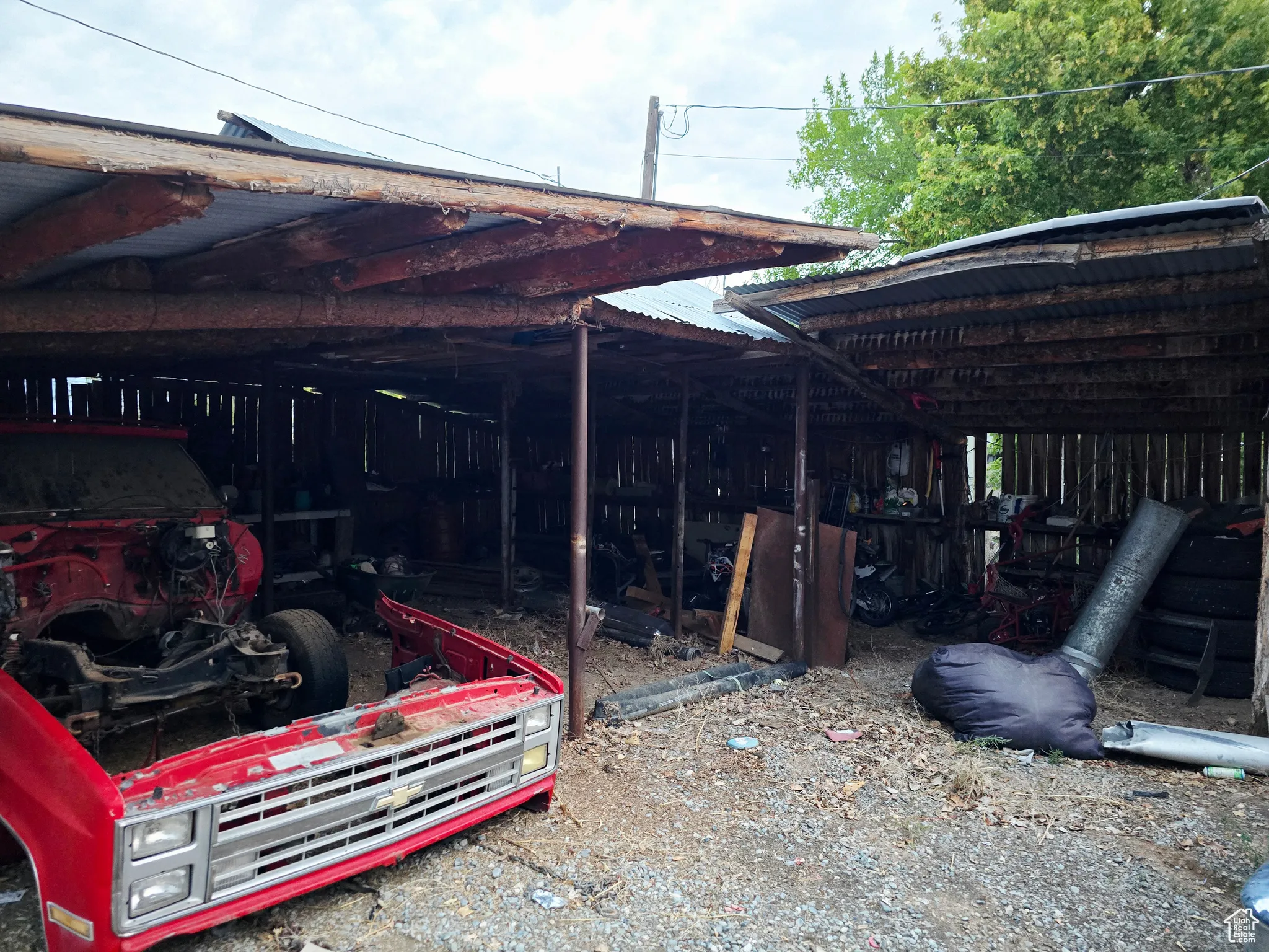 View of side of property with an outbuilding