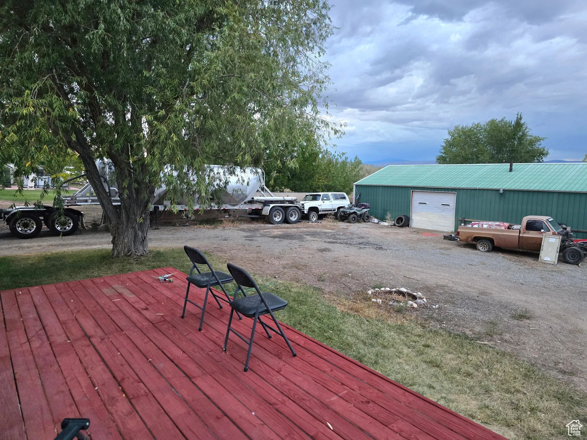 Deck featuring an outbuilding