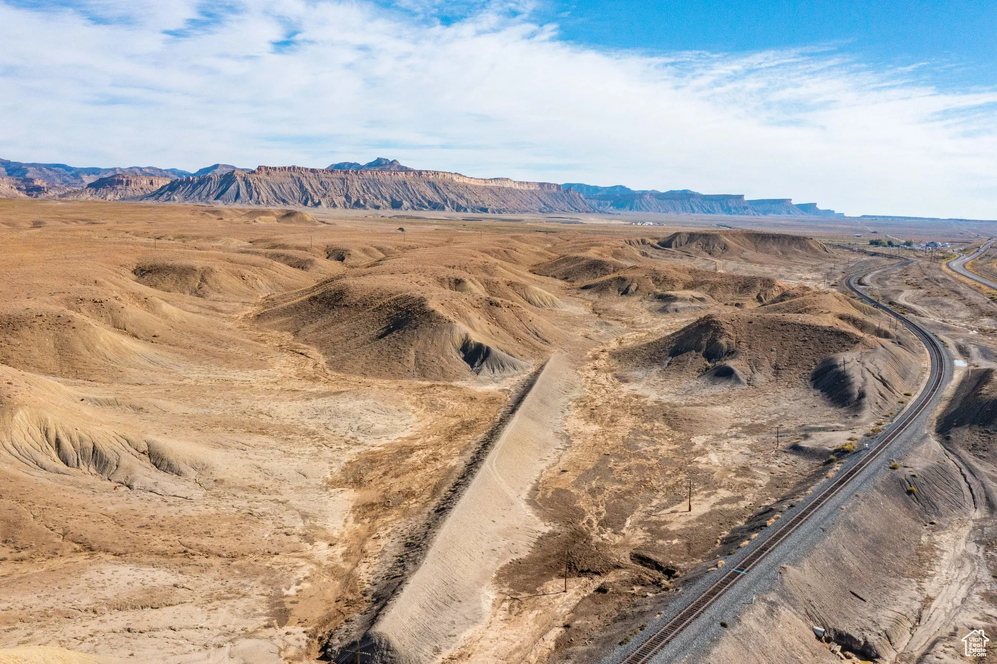 View of mountain backdrop featuring a desert landscape