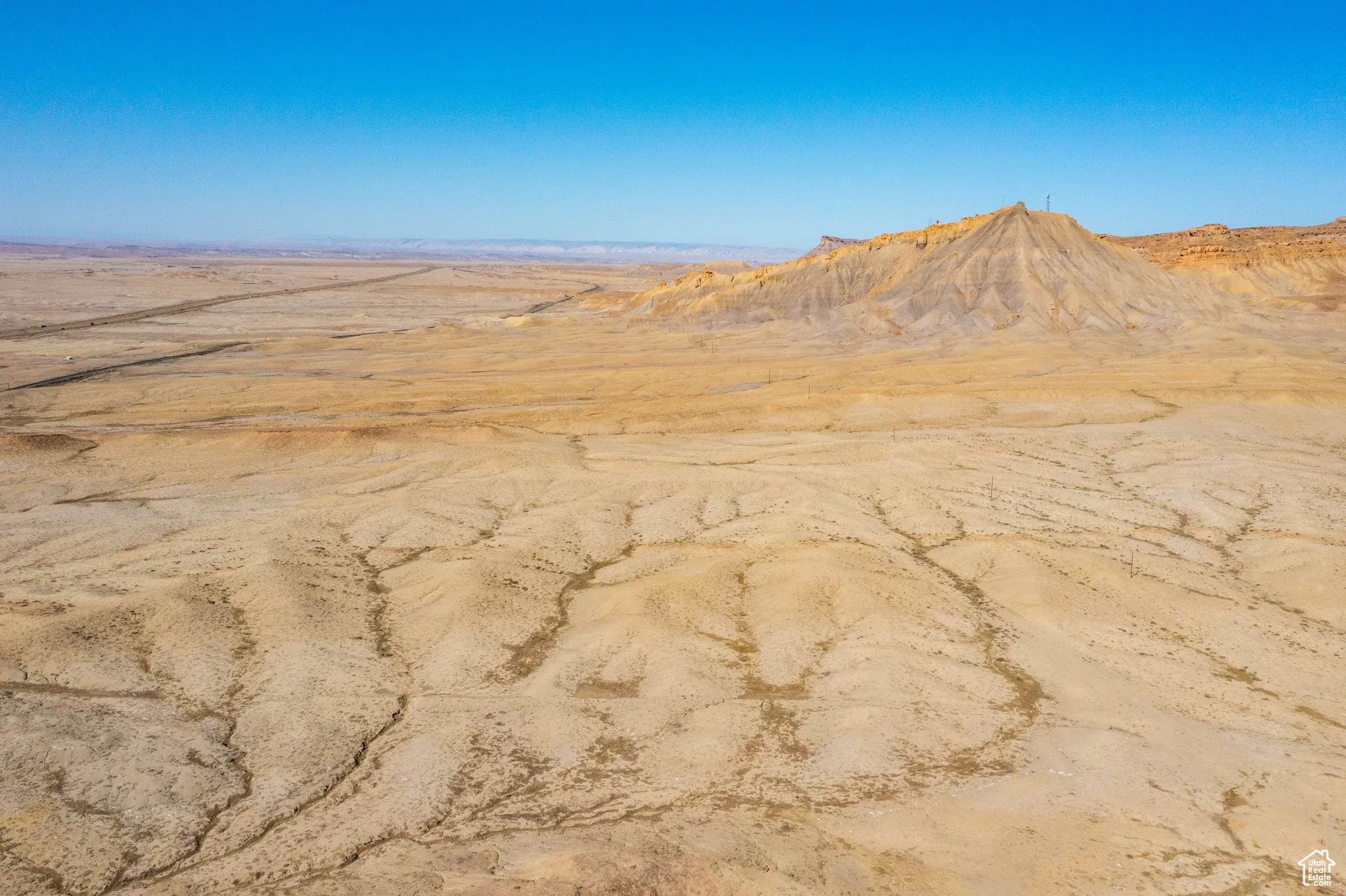 View of mountain backdrop with a desert landscape