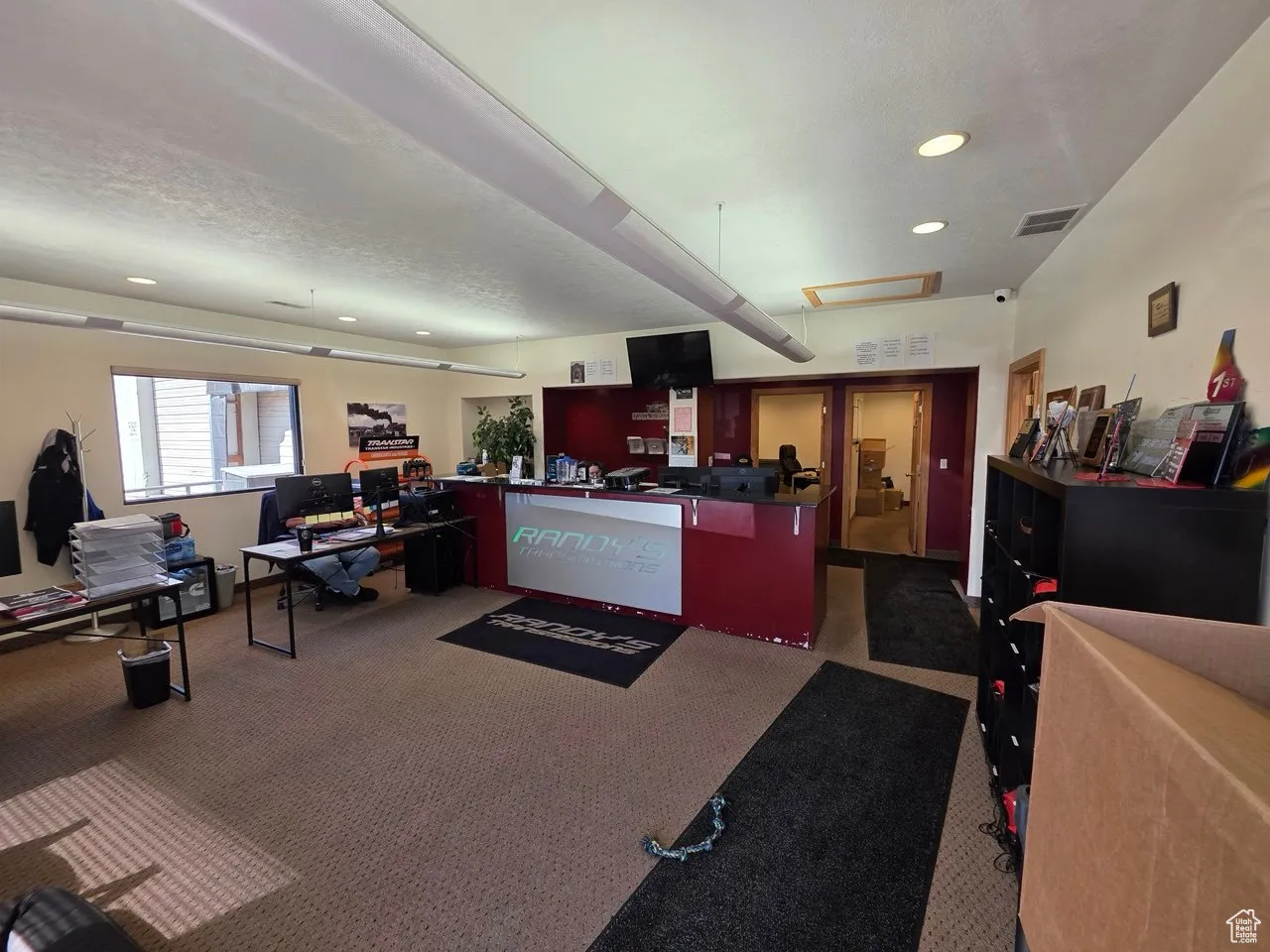 Welcome area featuring recessed lighting and a textured ceiling