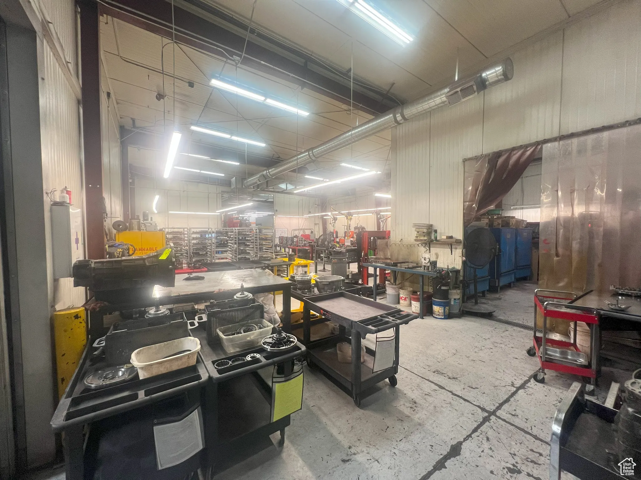 Miscellaneous room featuring concrete floors