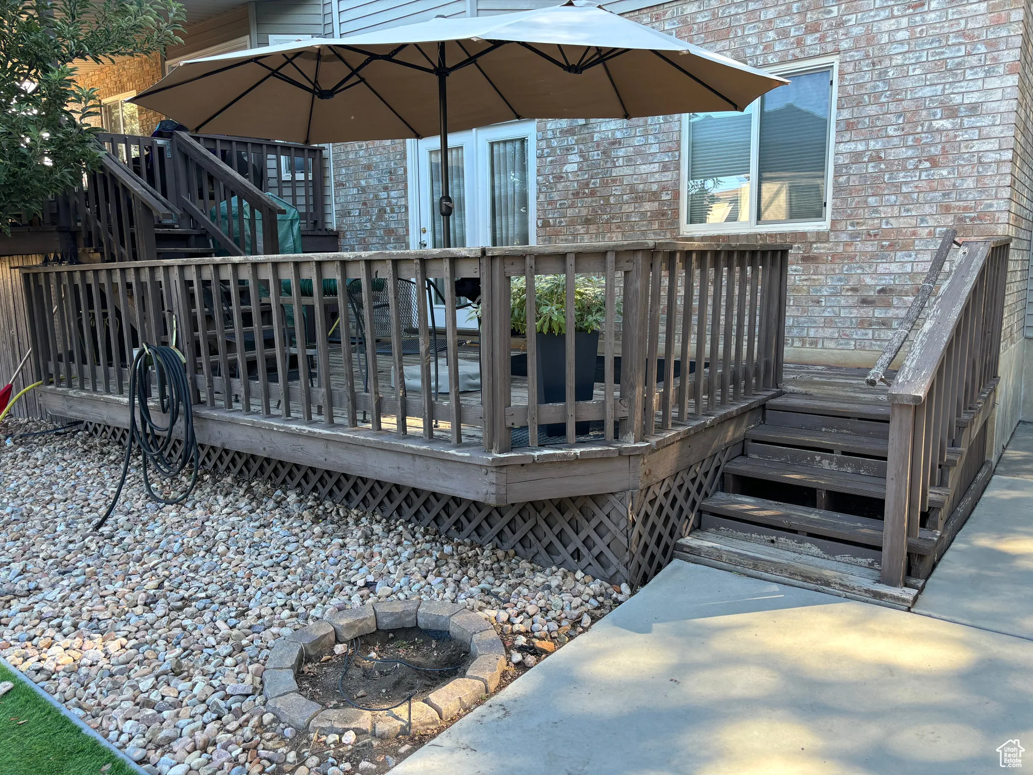 Wooden terrace featuring stairs